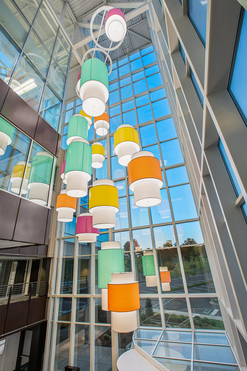 Colorful custom pendant lighting for commercial spaces. Wide range of Lumenate® options and powder coat finishes.